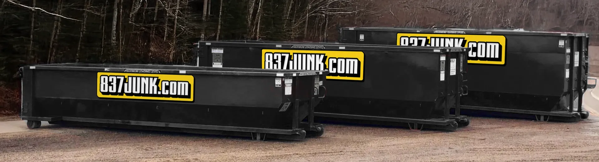 roll off dumpsters in 3 different sizes on display