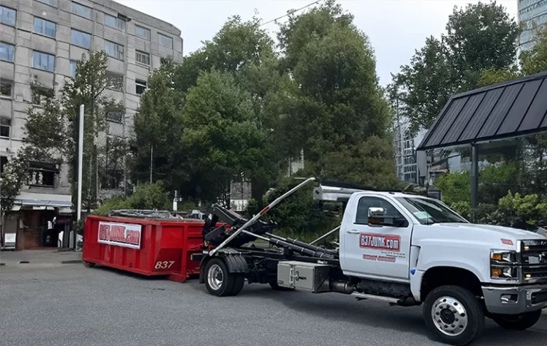 dumpster rental getting unloaded