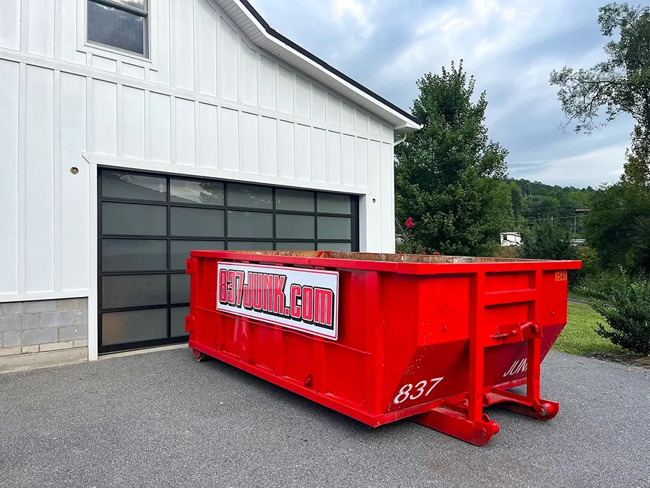 837junk dumpster at a residential home