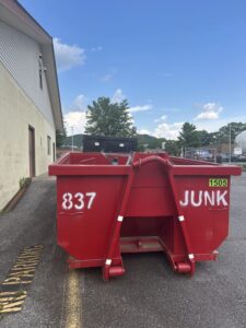 red 837 Junk Roll Off Container