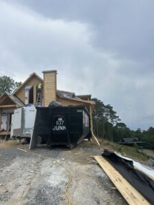 dumpster on a new home build construction site